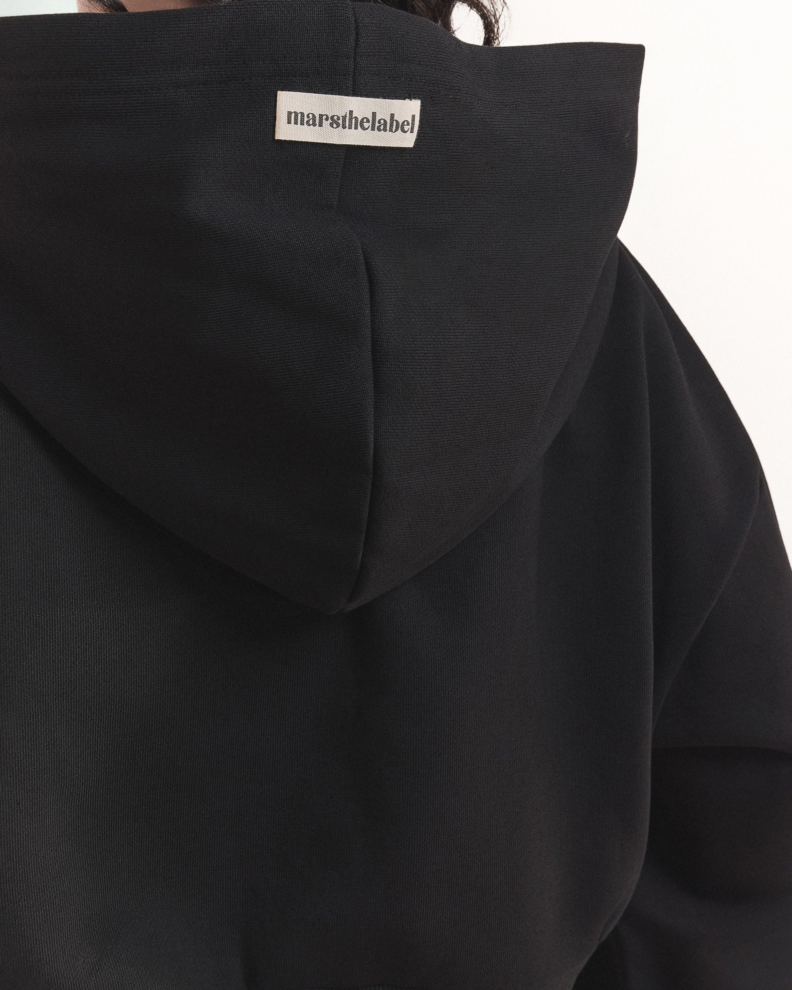 The Basic Crop Zip Hoodie in Black - Image 8
