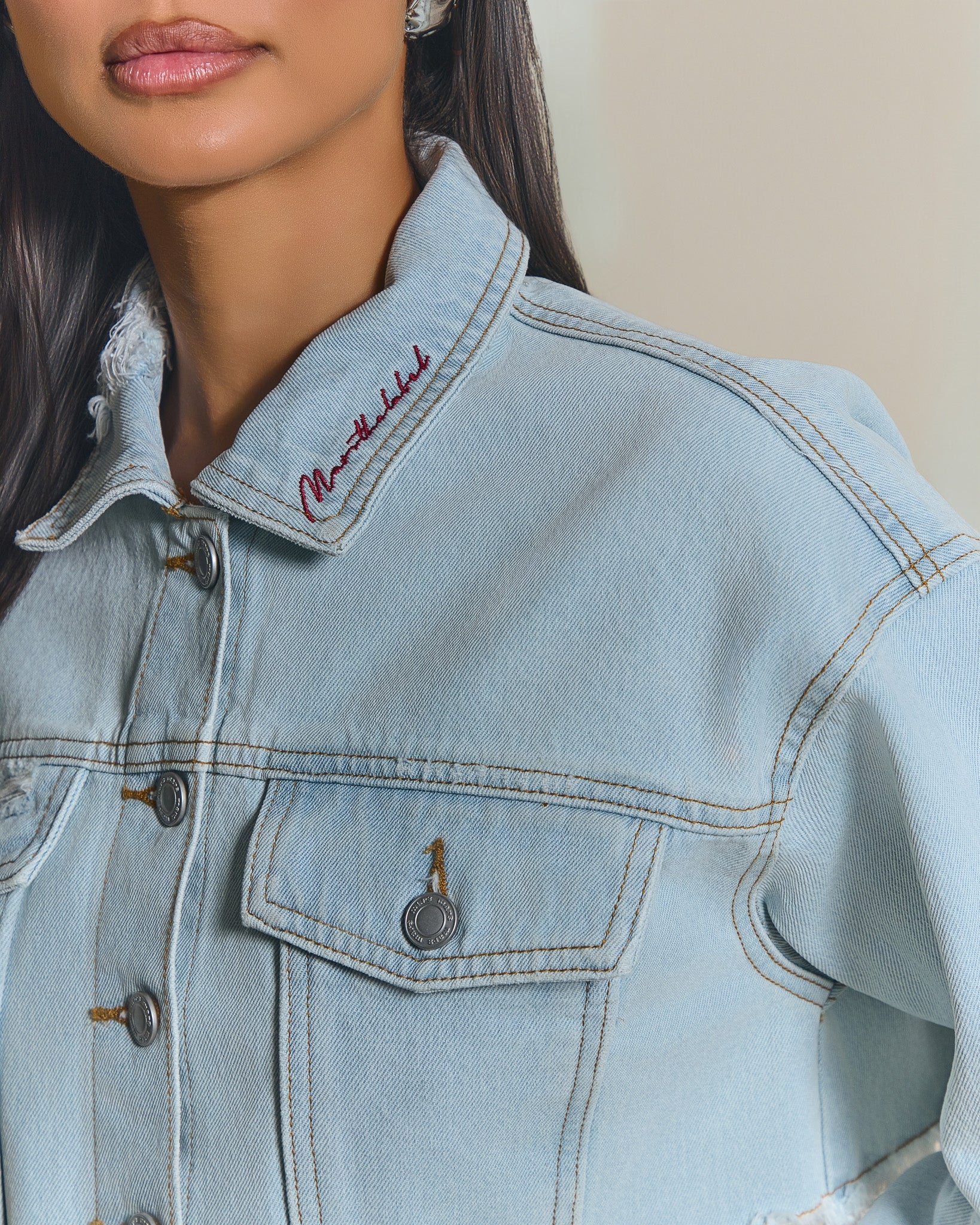 The Esha Cropped Denim Jacket in Light Wash Blue - Image 3