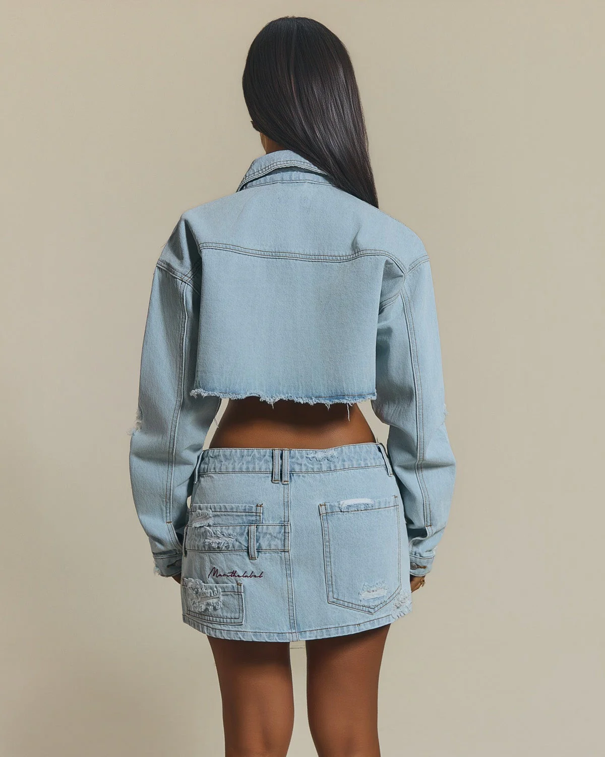 The Esha Cropped Denim Jacket in Light Wash Blue - Image 4