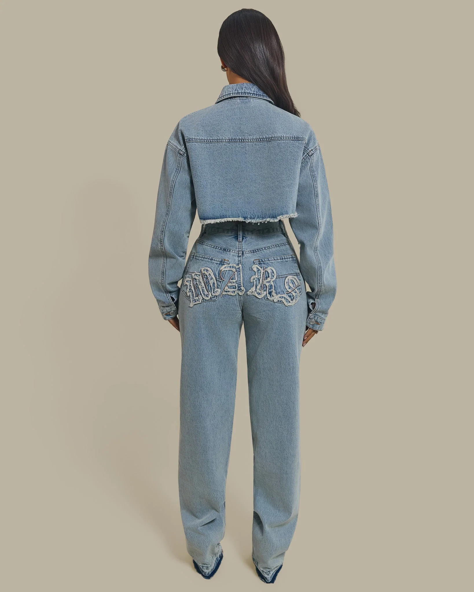 The Kali Mid-Rise Jeans in Light Wash Blue - Image 5