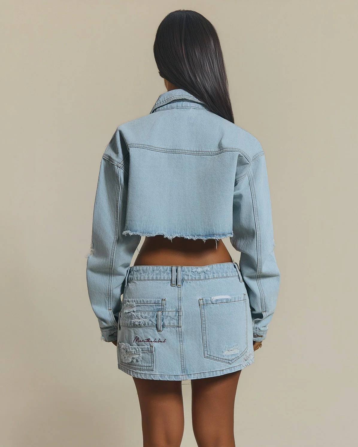 The Esha Denim Mini Skirt in Light Wash Blue - Image 3