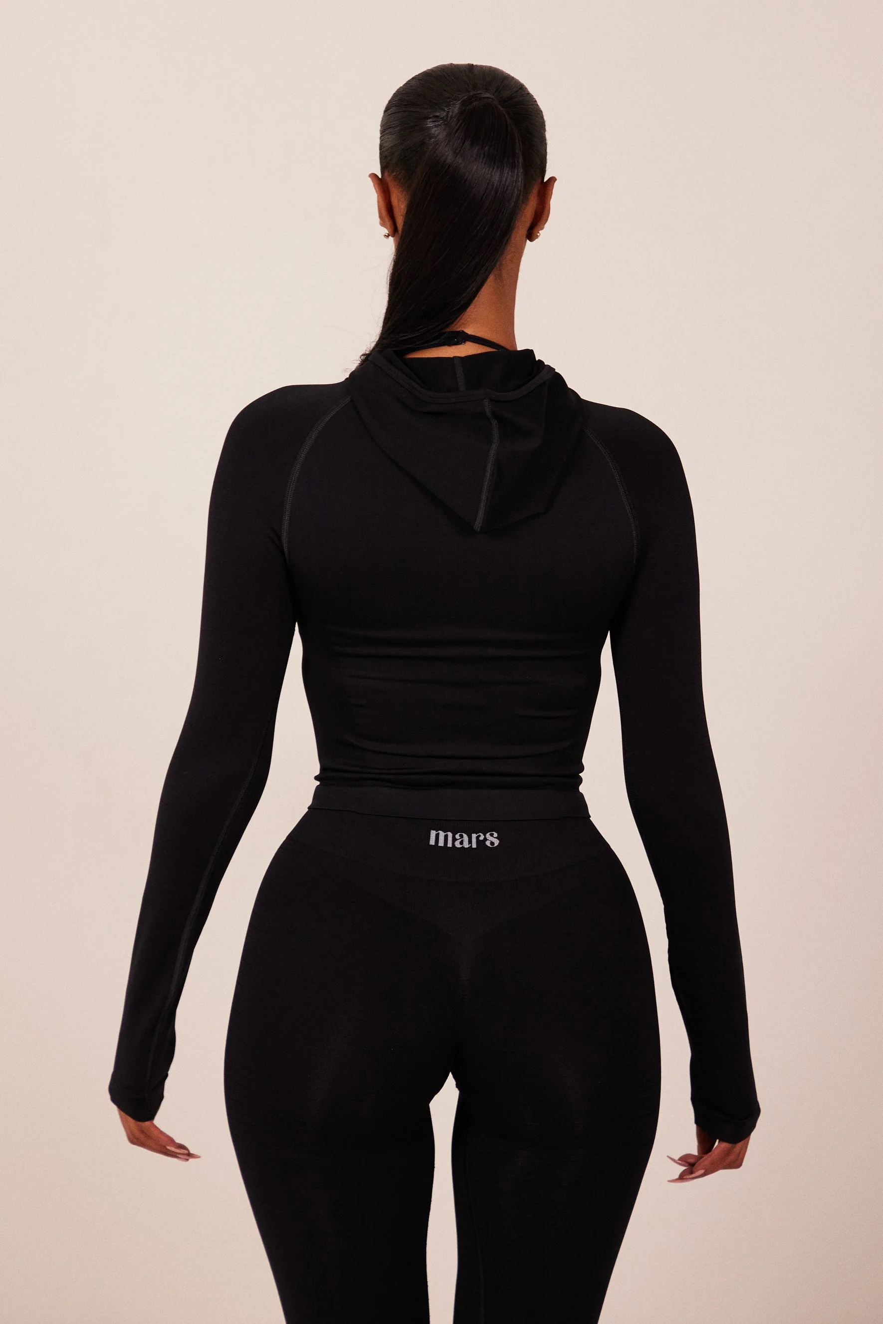 The Mars Seamless Hooded Zip Jacket in Black - Image 3