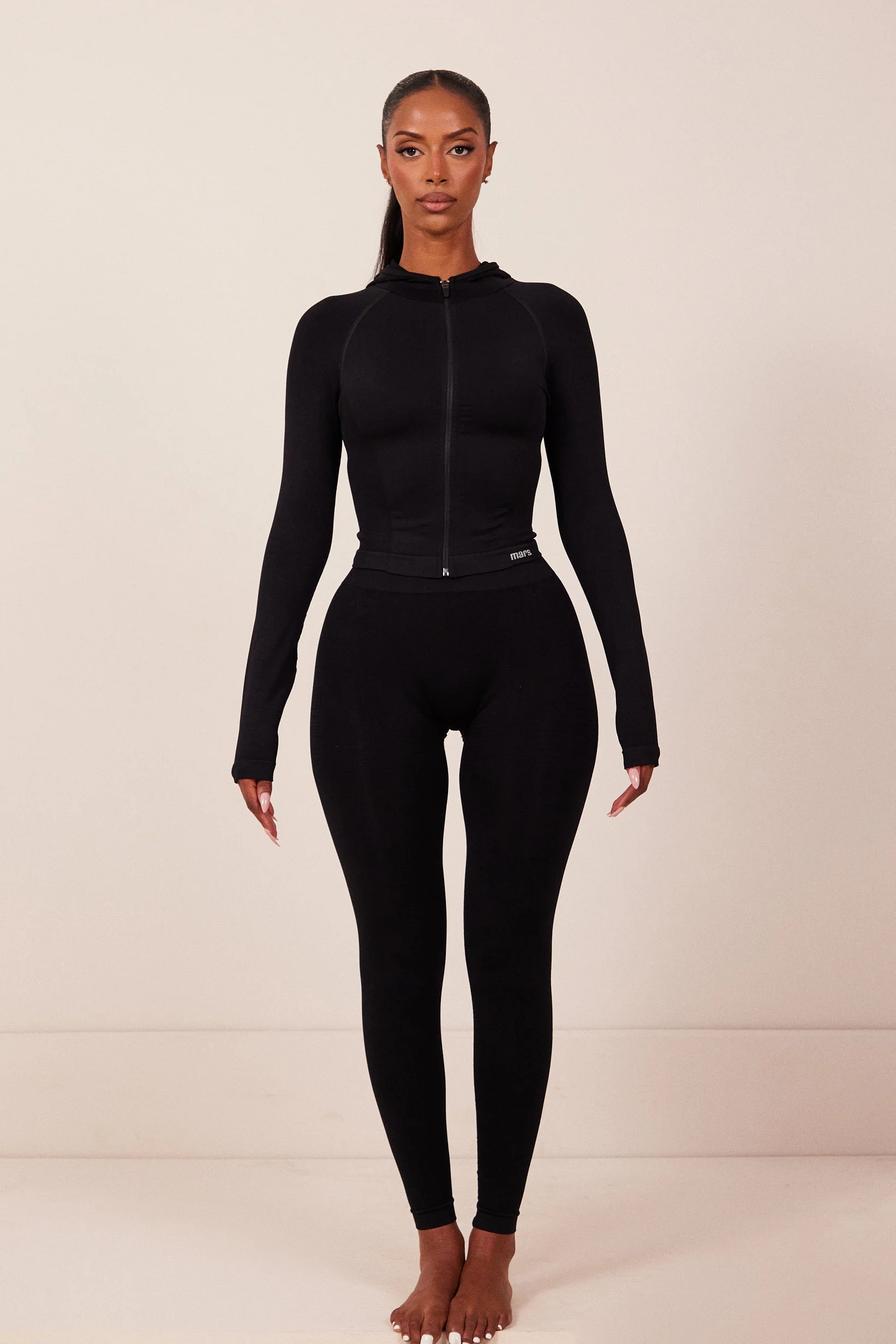 The Mars Seamless Hooded Zip Jacket in Black - Image 5