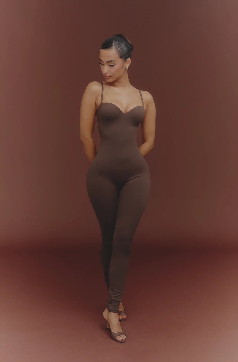 The Sculpt Jumpsuit in Brown - Image 9