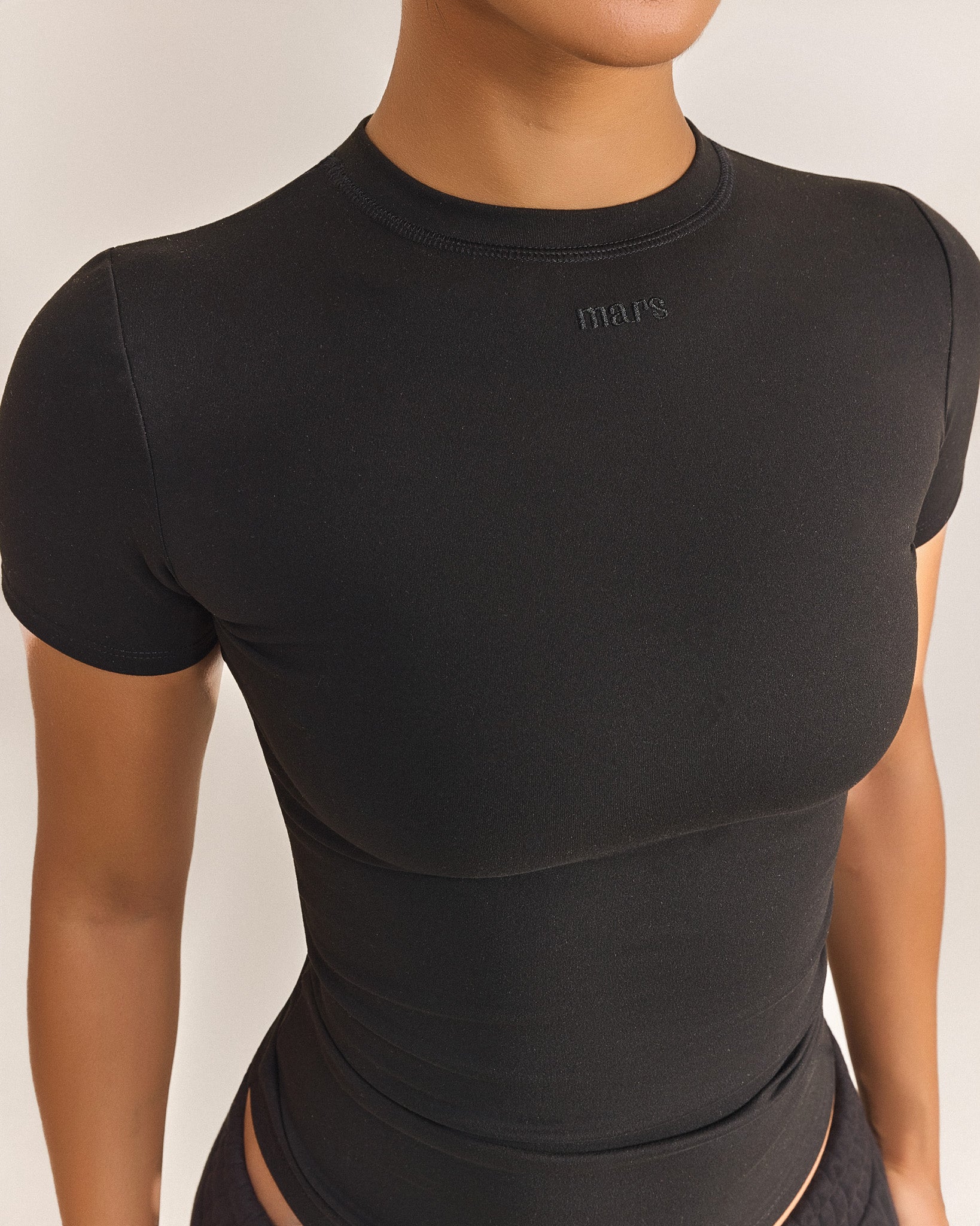 The Sculpt Short Sleeve Top in Black - Image 11