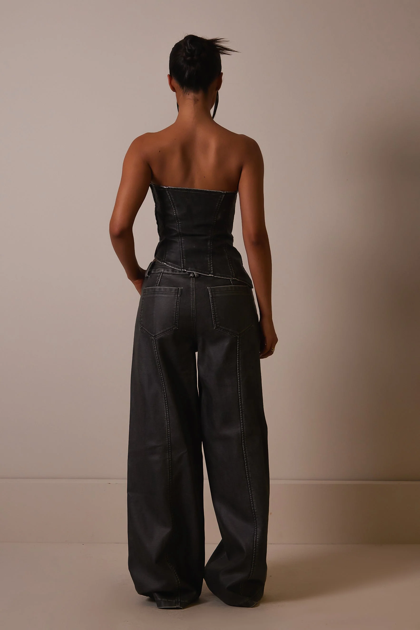The Distress Wash Asymmetric Leather Corset in Dark Wash - Image 3