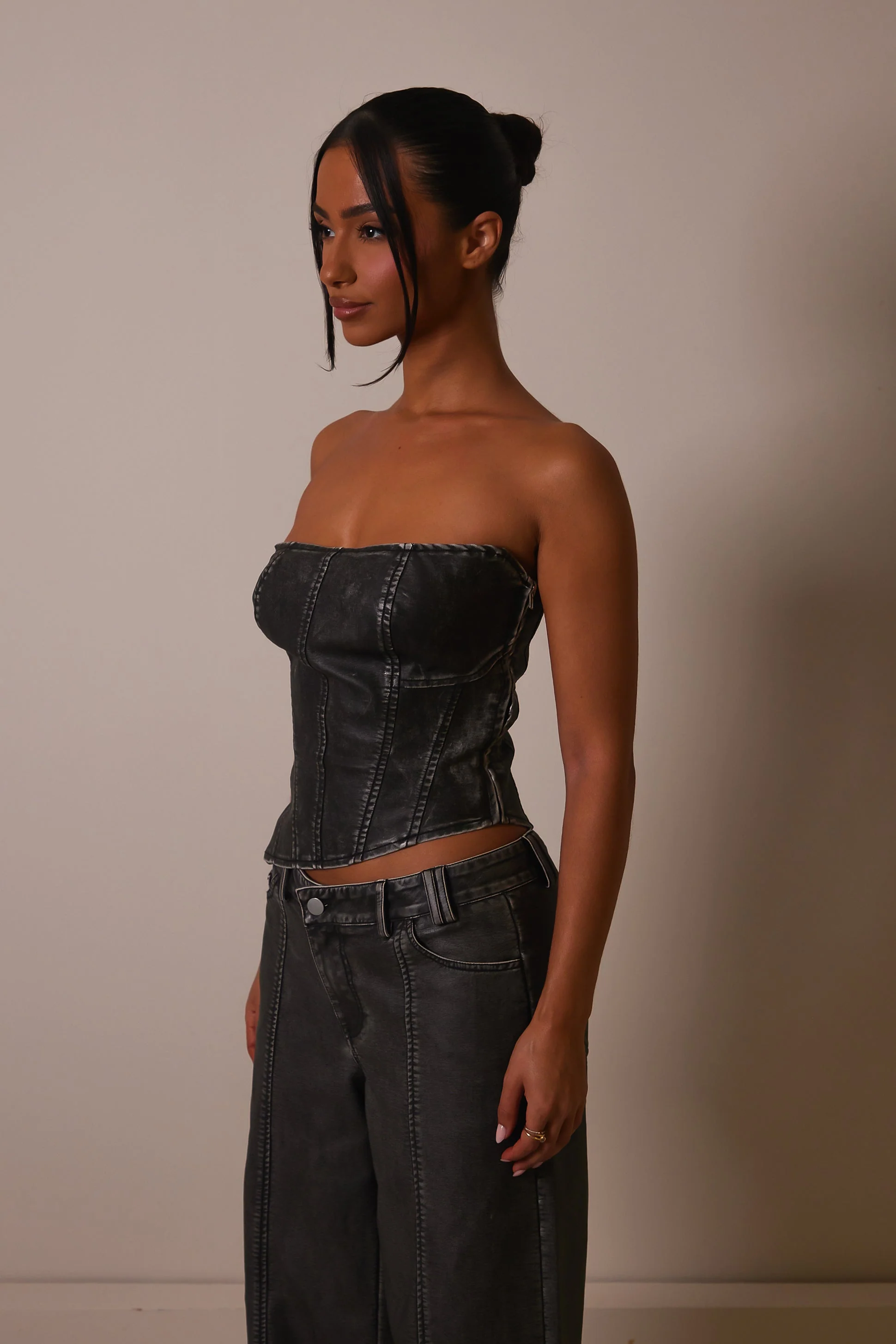 The Distress Wash Asymmetric Leather Corset in Dark Wash - Image 5